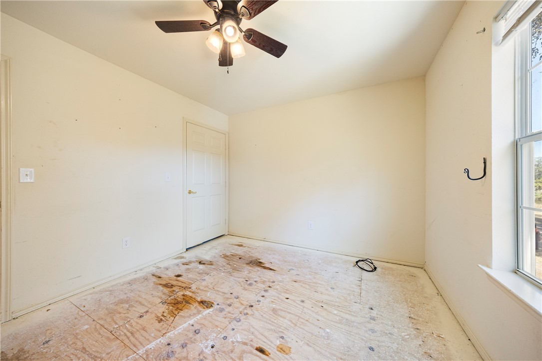 333 Mission River Oaks Road Woodsboro, TX 78393 - Photo 14 of 26 a view of a room with a window
