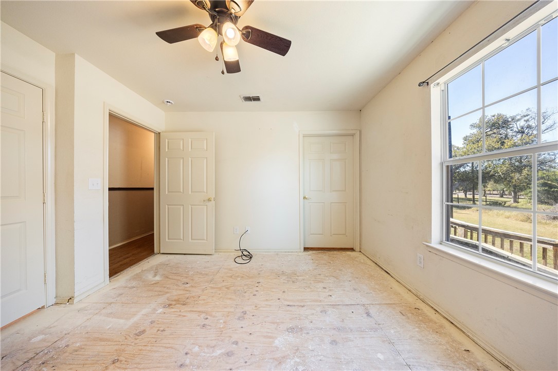 333 Mission River Oaks Road Woodsboro, TX 78393 - Photo 24 of 26 a view of an empty room with a window