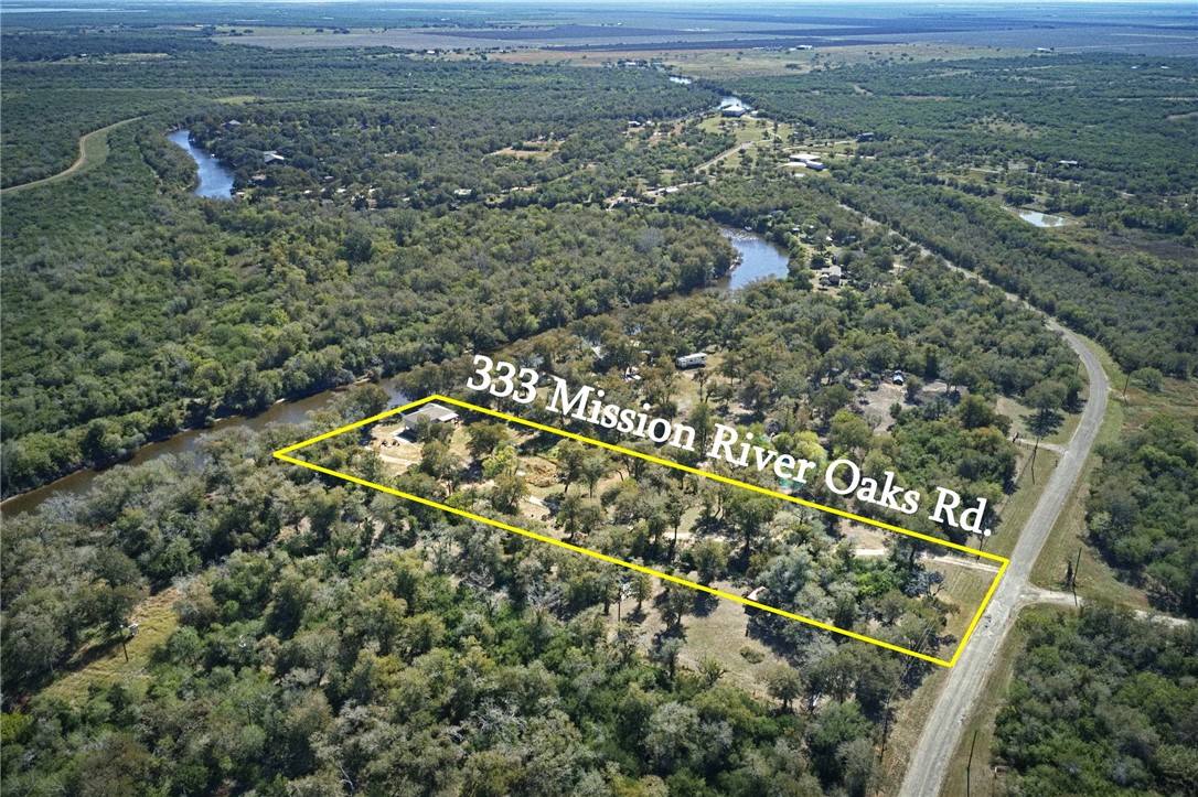 333 Mission River Oaks Road Woodsboro, TX 78393 - Photo 7 of 26 an aerial view of a residential houses with outdoor space