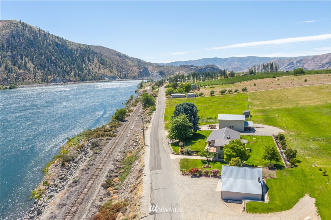 485 Stayman Flats Road Chelan, WA 98816 - Photo 2 of 32 a view of a city with ocean view