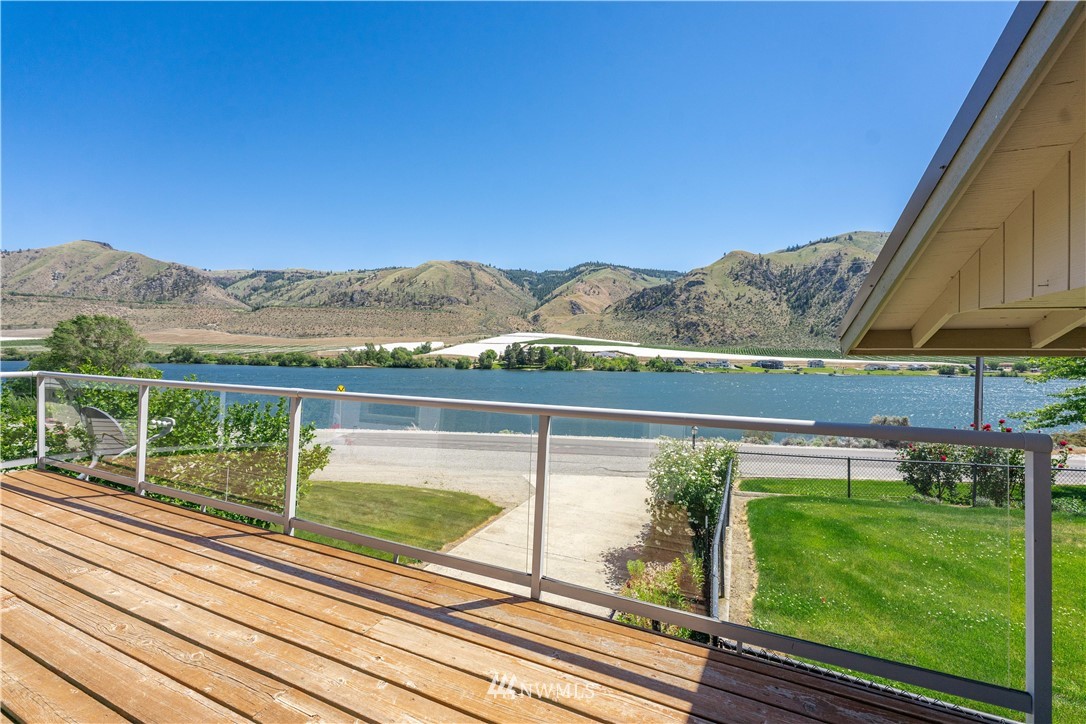 485 Stayman Flats Road Chelan, WA 98816 - Photo 11 of 32 a view of a city from a balcony with an outdoor space