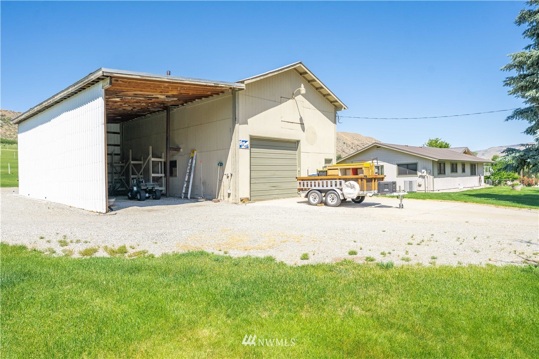485 Stayman Flats Road Chelan, WA 98816 - Photo 17 of 32 a view of house with yard