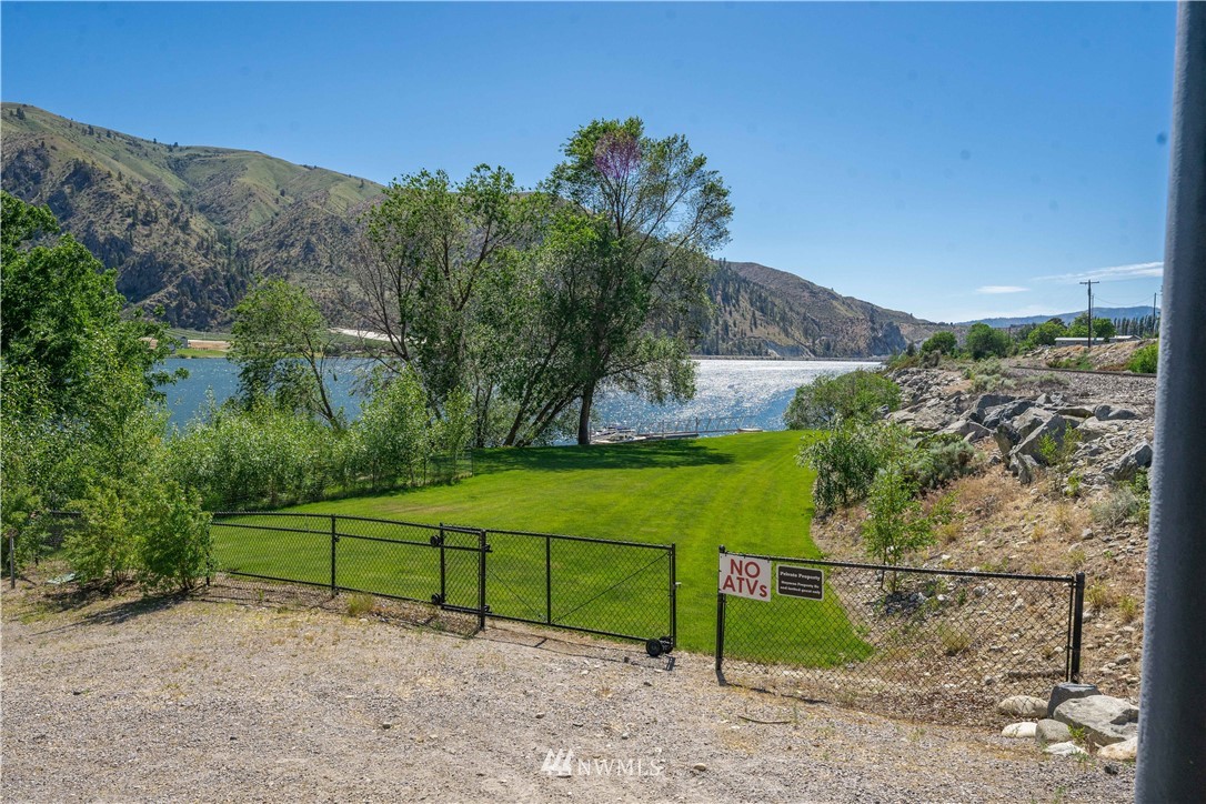 485 Stayman Flats Road Chelan, WA 98816 - Photo 24 of 32 a view of a park with large trees