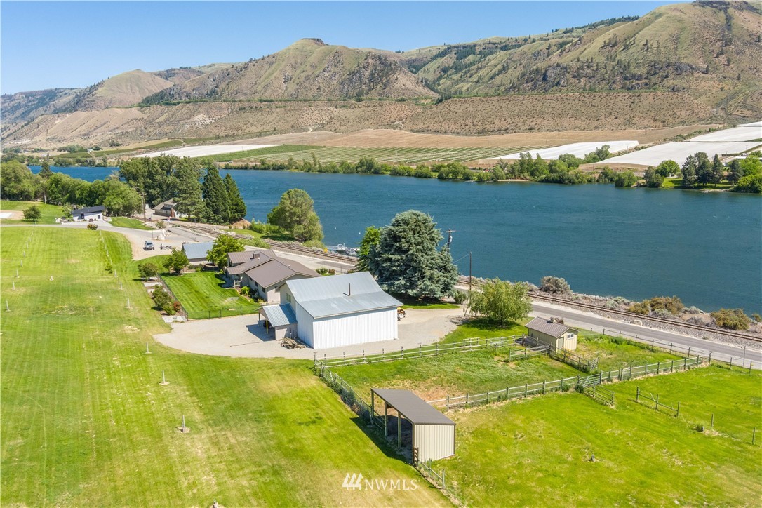 485 Stayman Flats Road Chelan, WA 98816 - Photo 30 of 32 a view of a lake with a mountain