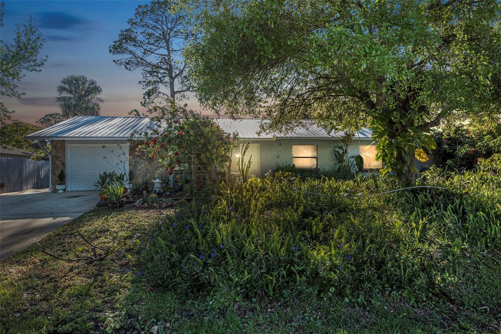 3228 Unity Tree Drive Edgewater, FL 32141 - Photo 1 of 1 a view of a house with a yard