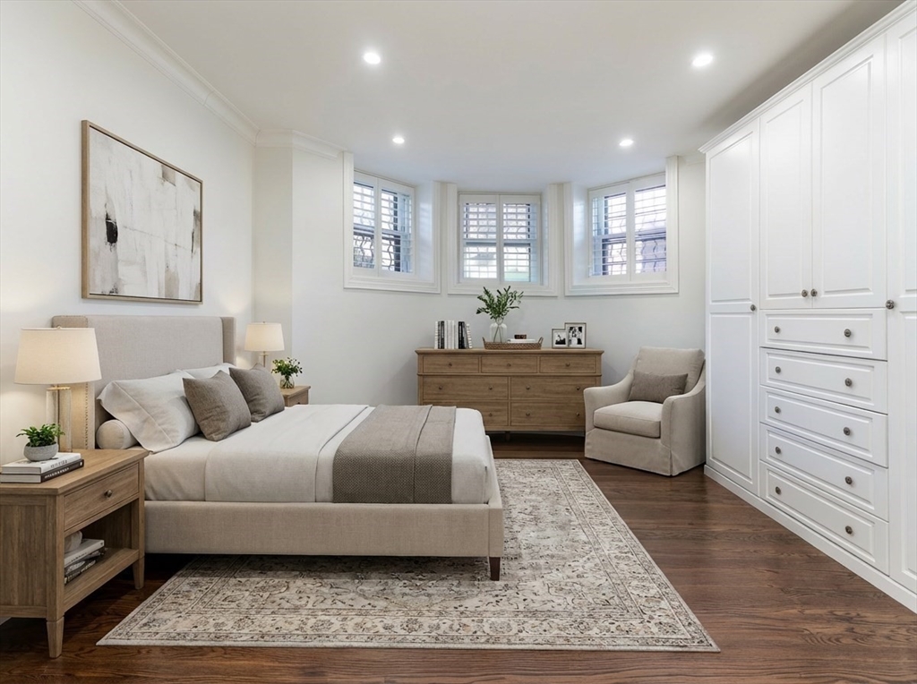 461 Beacon Street, Unit 1 Boston, MA 02115 - Photo 4 of 8 a bedroom with a bed and window