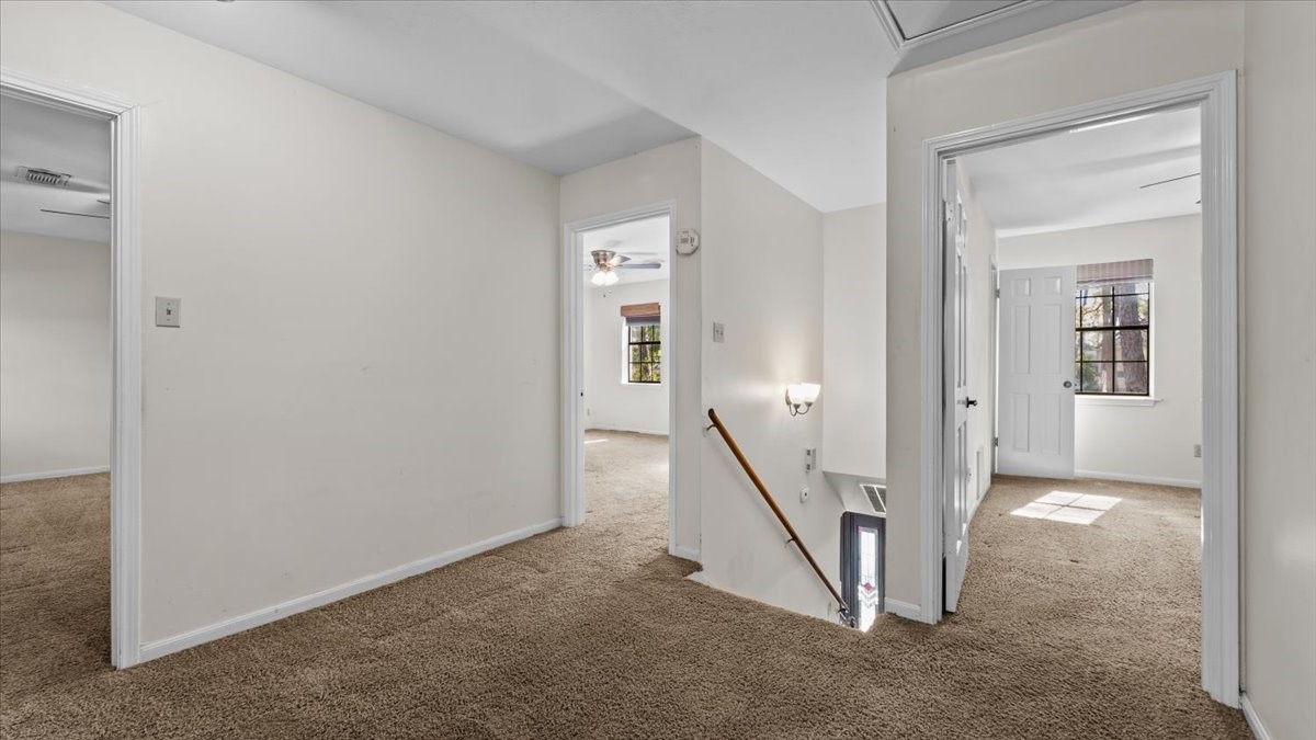 6502 Moccasin Bend Drive Spring, TX 77379 - Photo 33 of 38 a view of a hallway with staircase