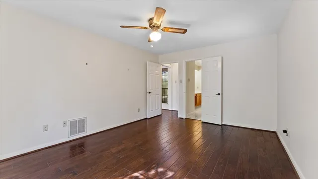 a view of a hallway with staircase