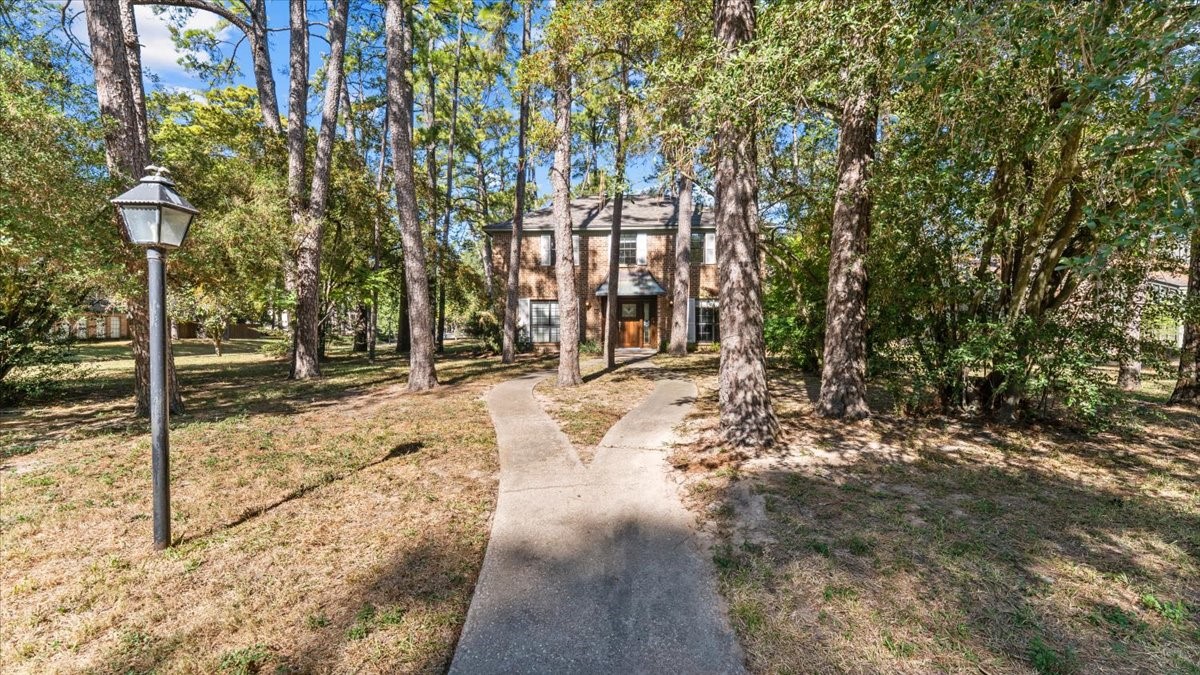 6502 Moccasin Bend Drive Spring, TX 77379 - Photo 5 of 38 a view of road with trees