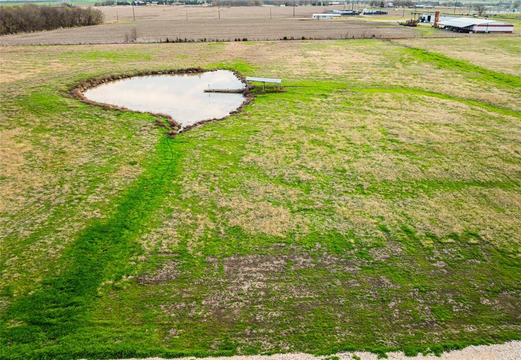 Lot 14 Farm Road Blossom, TX 75416 - Photo 3 of 6 a view of a swimming pool and an outdoor space