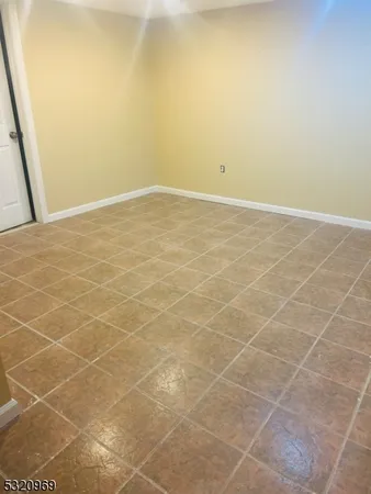 a bathroom with a glass door shower