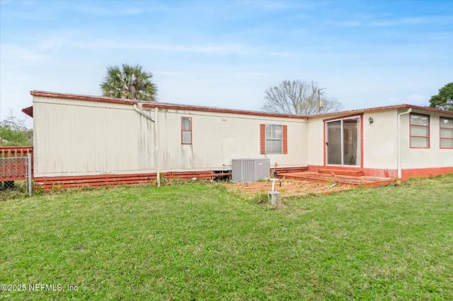a view of a backyard of a house