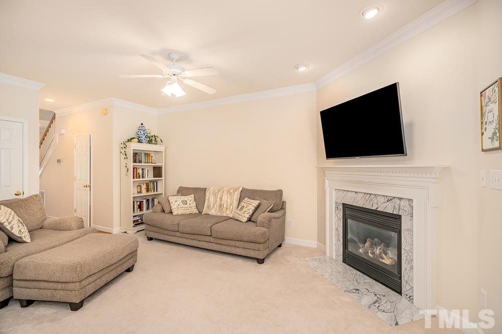 4559 Treerose Way Raleigh, NC 27606 - Photo 4 of 15 Living room with fireplace