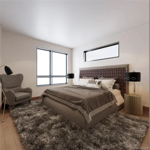 a bedroom with bed and window