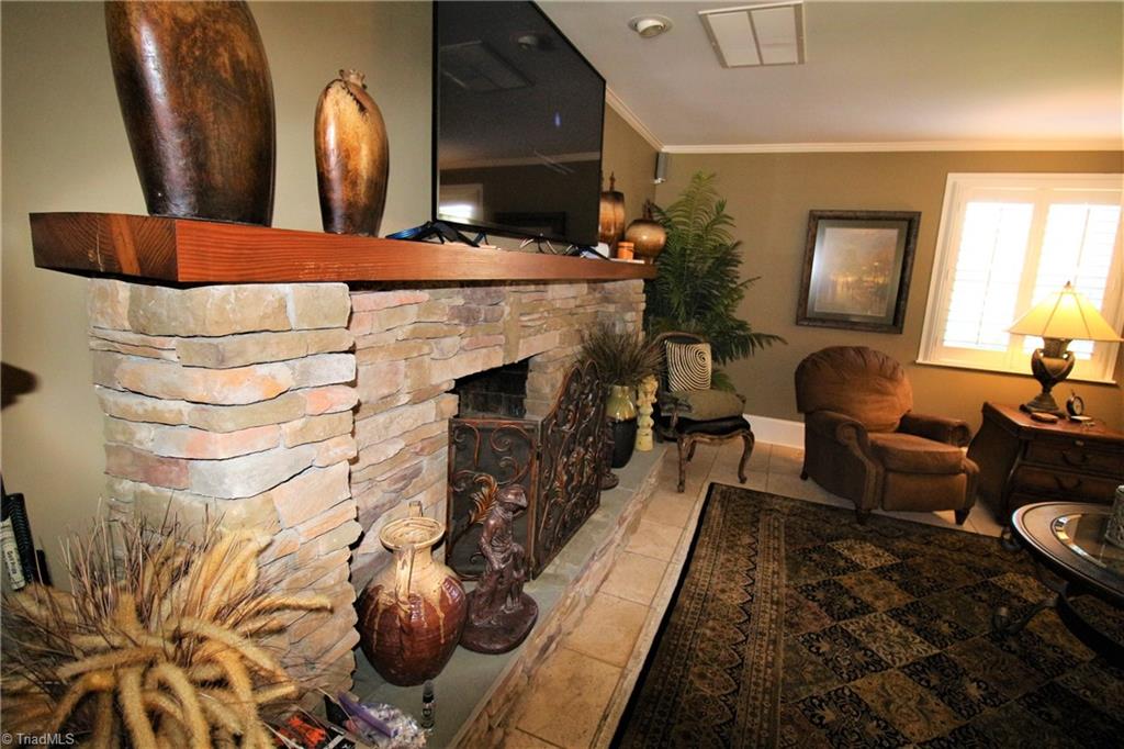 2532 Darrow Road Walkertown, NC 27051 - Photo 17 of 38 Stone fireplace in den