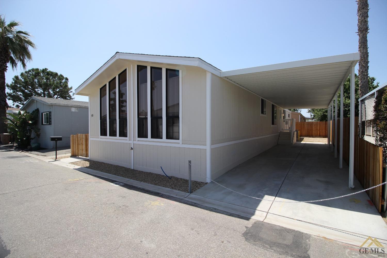 Undisclosed Address Bakersfield, CA 93308 - Photo 1 of 26 a view of a house with a large window