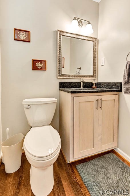 11431 Driscoll Road Chester, VA 23831 - Photo 19 of 41 a bathroom with a toilet a sink and a mirror