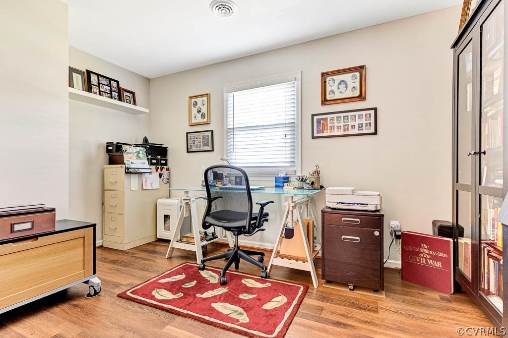 11431 Driscoll Road Chester, VA 23831 - Photo 20 of 41 a work room with furniture and wooden floor