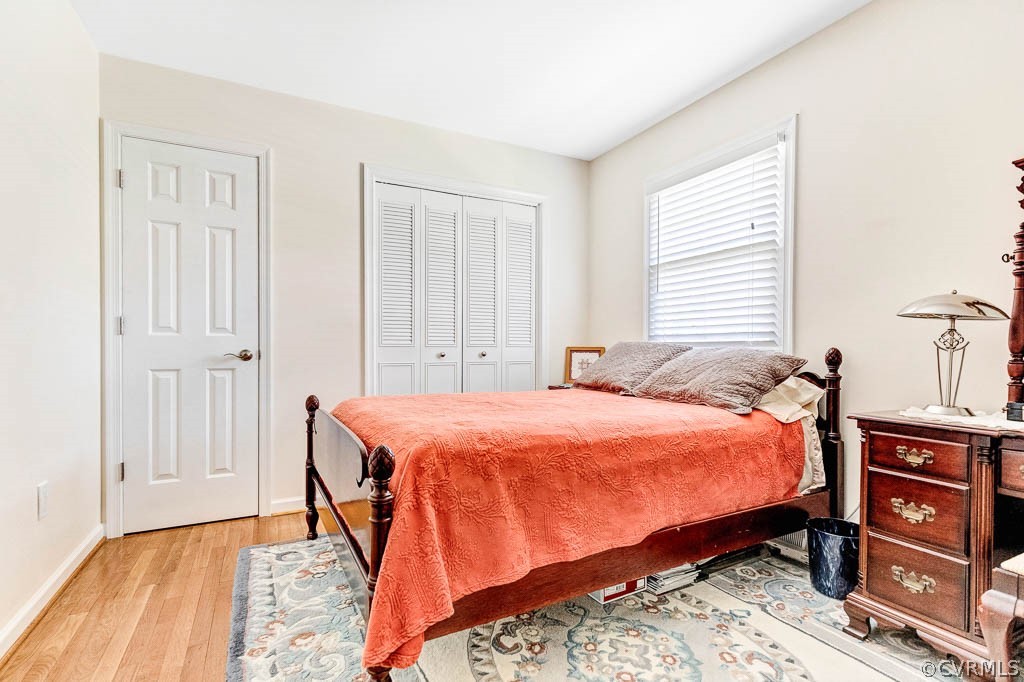 11431 Driscoll Road Chester, VA 23831 - Photo 24 of 41 a bedroom with a bed and a dresser
