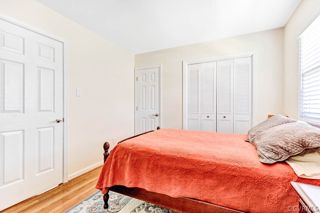 11431 Driscoll Road Chester, VA 23831 - Photo 25 of 41 a bedroom with a bed and a window