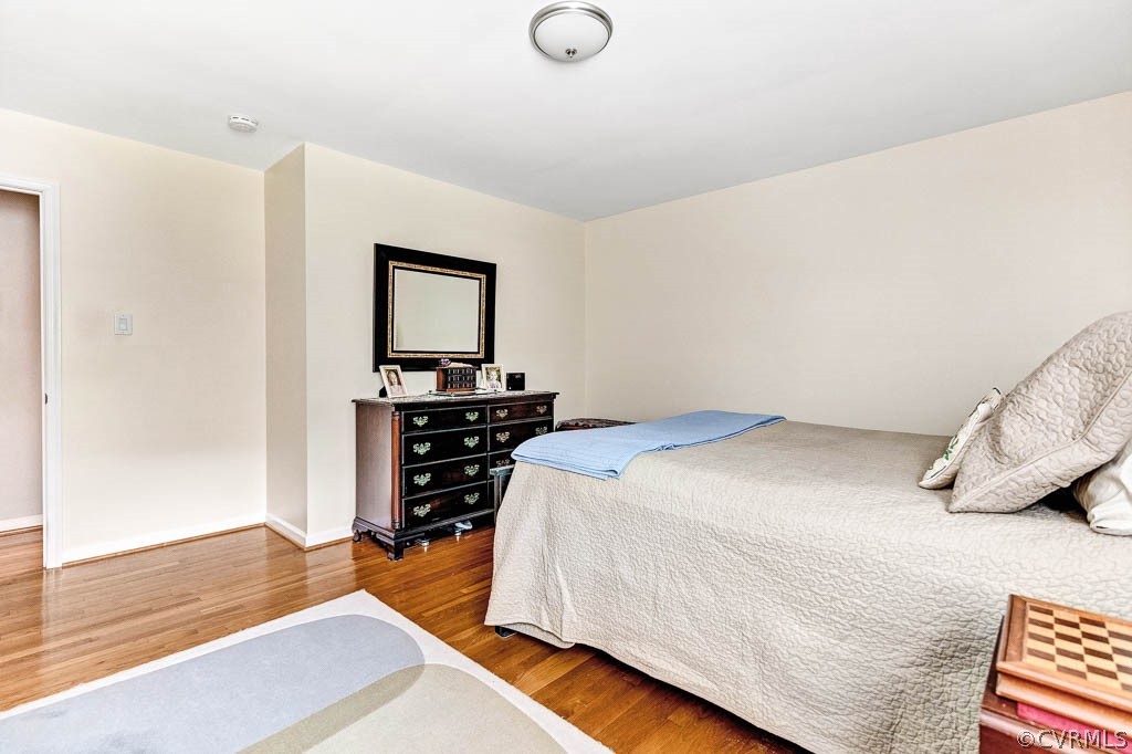 11431 Driscoll Road Chester, VA 23831 - Photo 29 of 41 a bedroom with a bed and a dresser