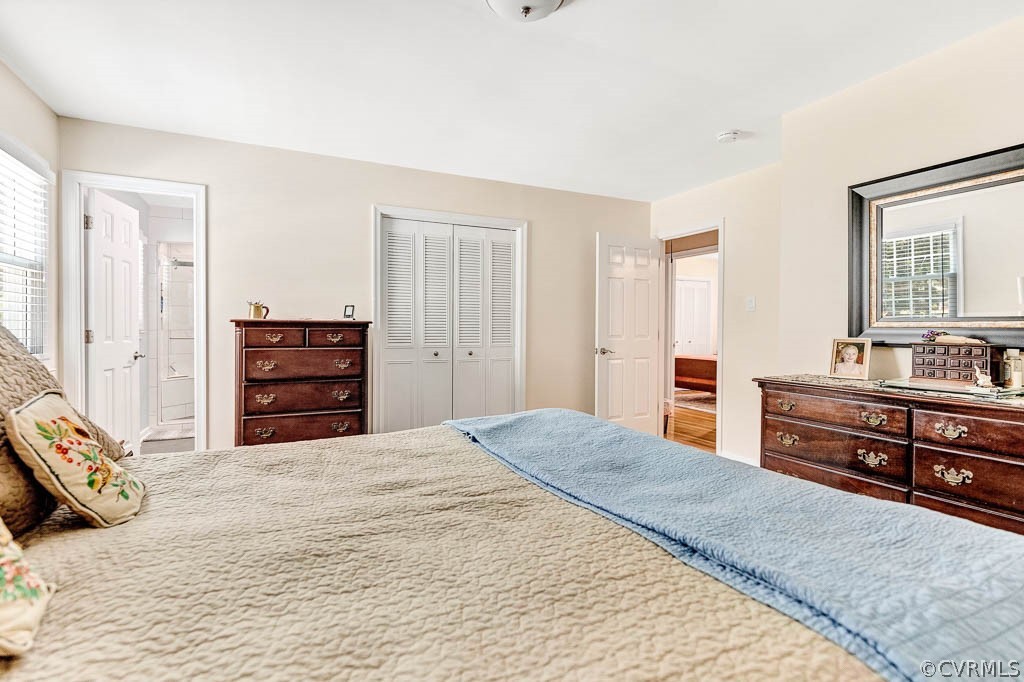 11431 Driscoll Road Chester, VA 23831 - Photo 30 of 41 a bedroom with a bed and a dresser
