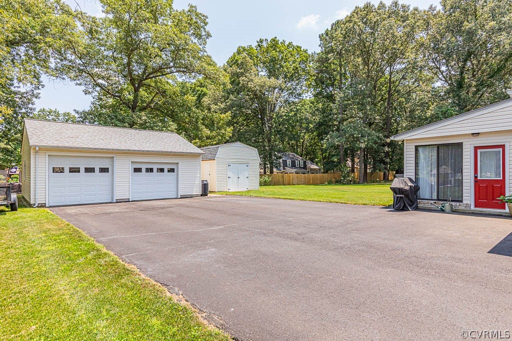 11431 Driscoll Road Chester, VA 23831 - Photo 37 of 41 a view of a house with swimming pool and a yard