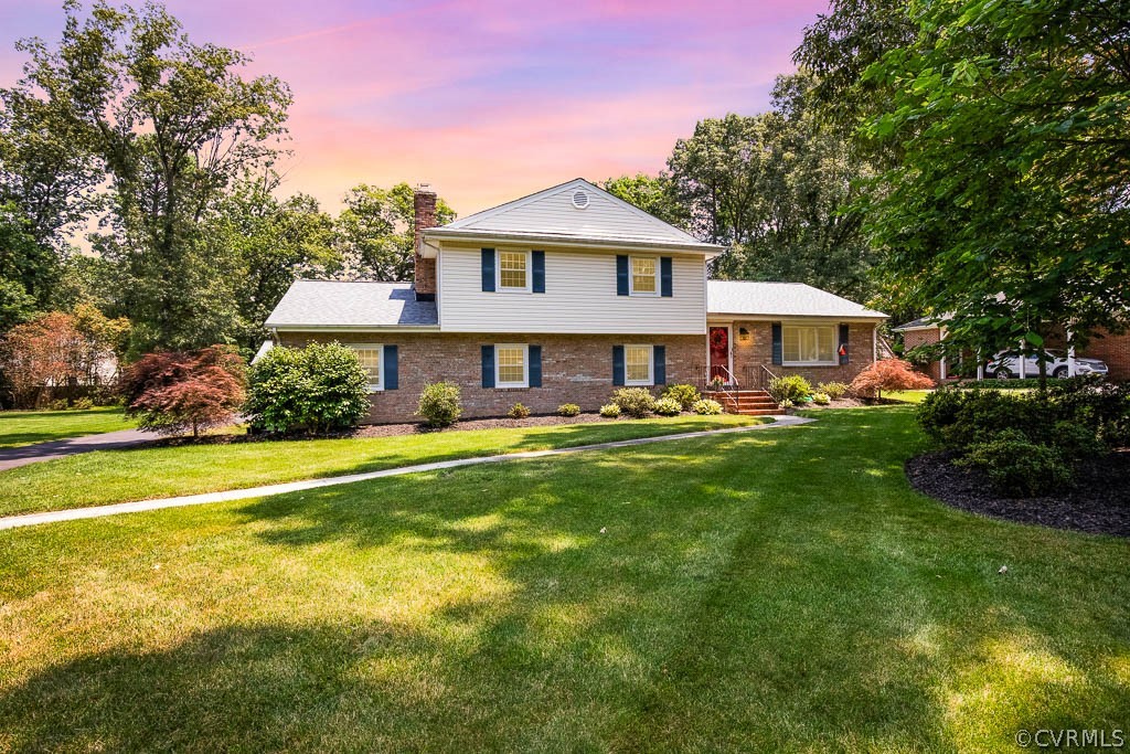11431 Driscoll Road Chester, VA 23831 - Photo 41 of 41 a front view of a house with swimming pool having outdoor seating