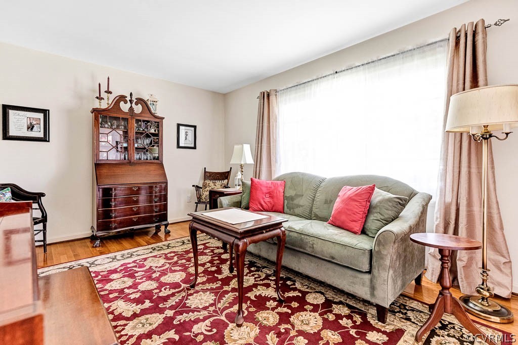 11431 Driscoll Road Chester, VA 23831 - Photo 5 of 41 a living room with furniture and a flat screen tv