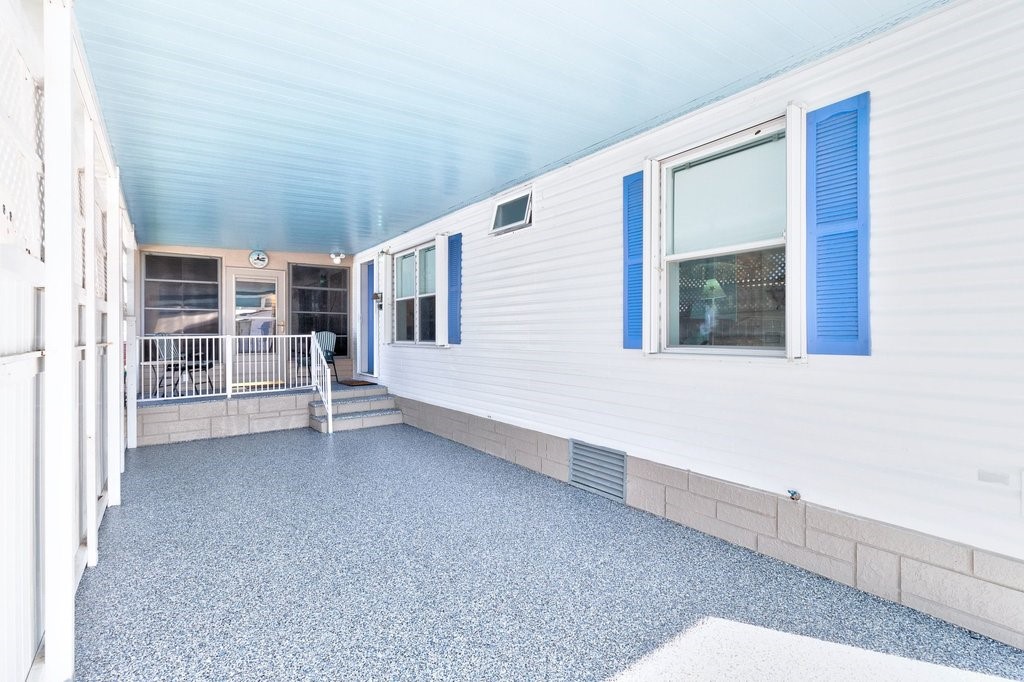 7605 Cedar Bark Road Sebastian, FL 32976 - Photo 26 of 34 a view of a house with a large window