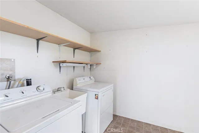 wooden floor in an empty room with glass windows