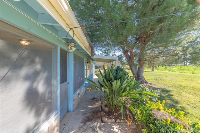 a view of a yard with an outdoor space