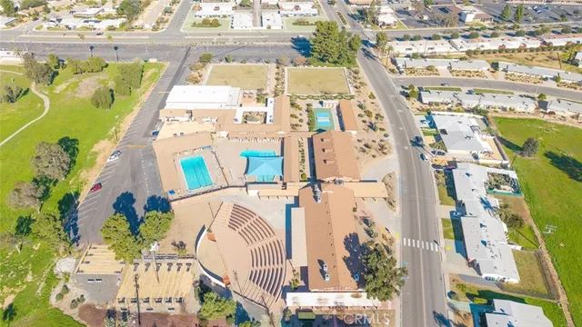 an aerial view of a house with a ocean view