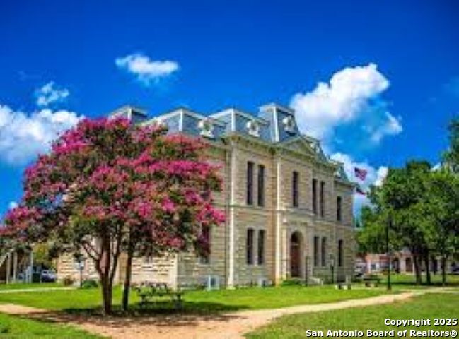 Lot 85 Headwaters Ranch Road Kendalia, TX 78027 - Photo 7 of 36 front view of a house with a yard