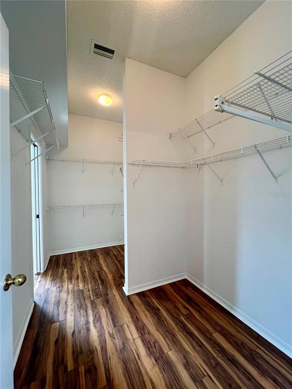 3515 Fox Squirrel Lane Valrico, FL 33596 - Photo 13 of 24 a view of empty room with wooden floor