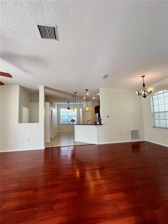 3515 Fox Squirrel Lane Valrico, FL 33596 - Photo 4 of 24 a view of empty room with wooden floor