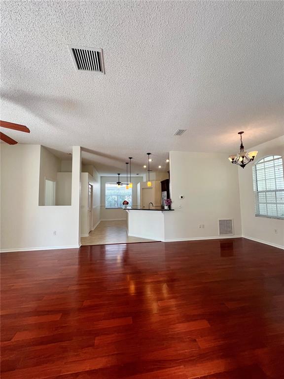 3515 Fox Squirrel Lane Valrico, FL 33596 - Photo 5 of 24 a view of empty room with wooden floor