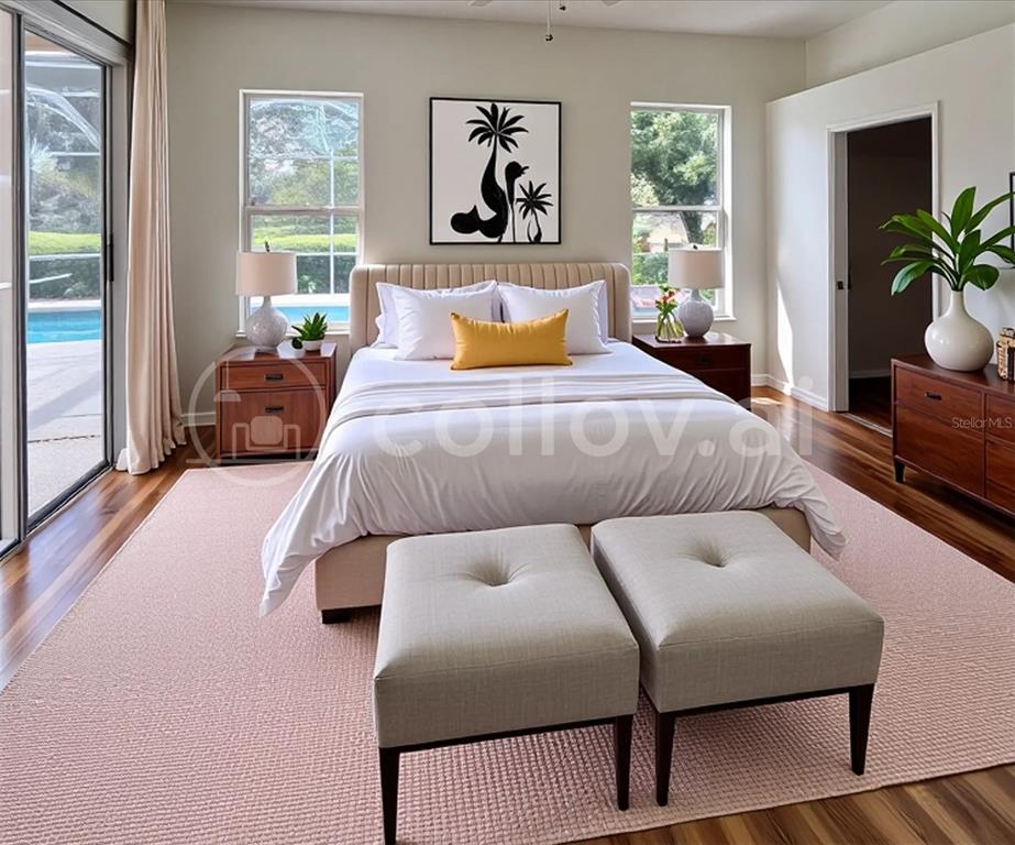 3515 Fox Squirrel Lane Valrico, FL 33596 - Photo 9 of 24 a bedroom with a bed and wooden floor