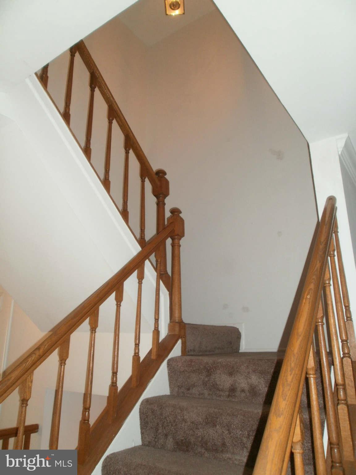 10520 Reed's Landing Circle Burke, VA 22015 - Photo 11 of 30 Dramatic Turned Stairwell
