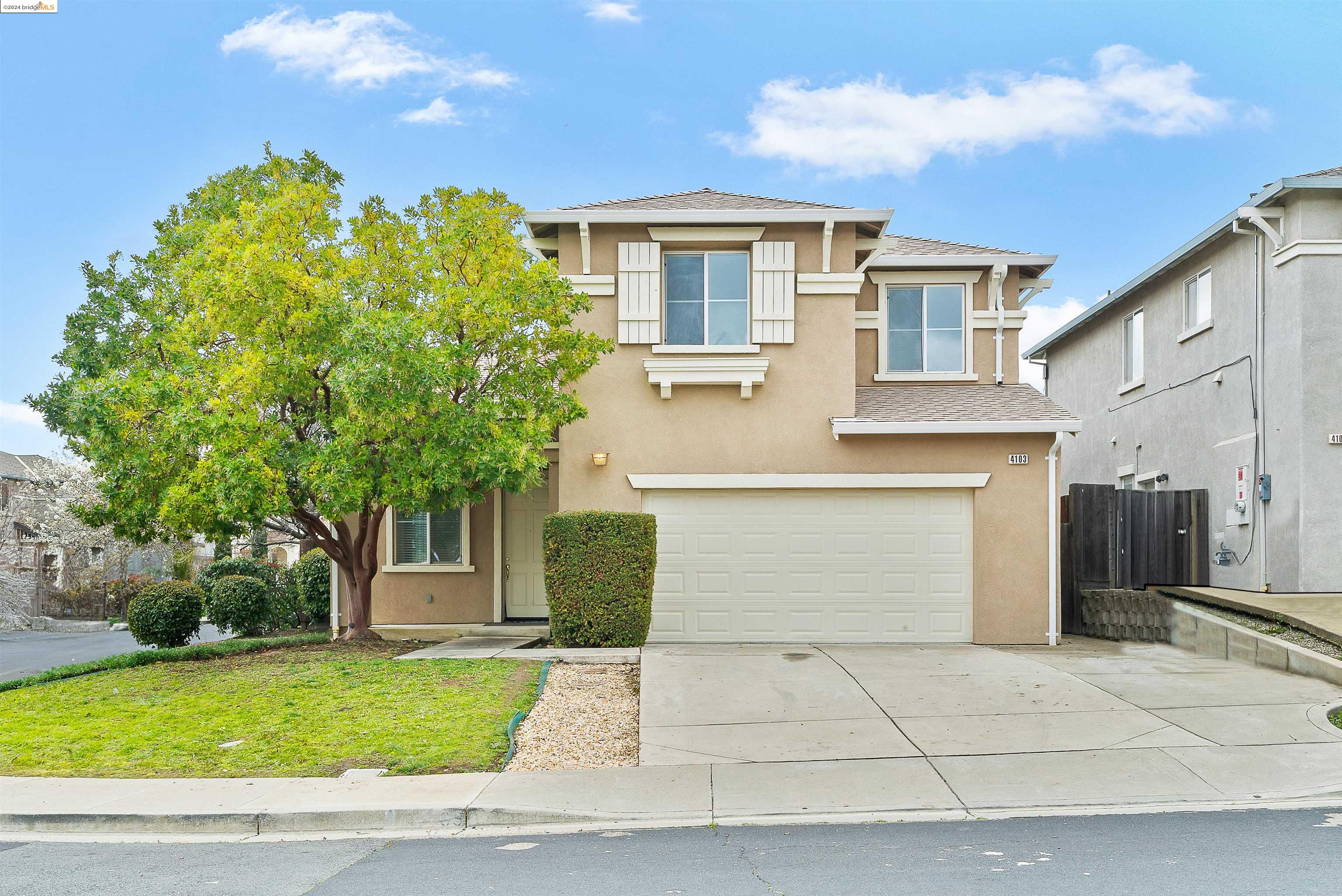 4103 Mt Isabel Road Antioch, CA 94531 - Photo 1 of 1 a front view of a house with a garden