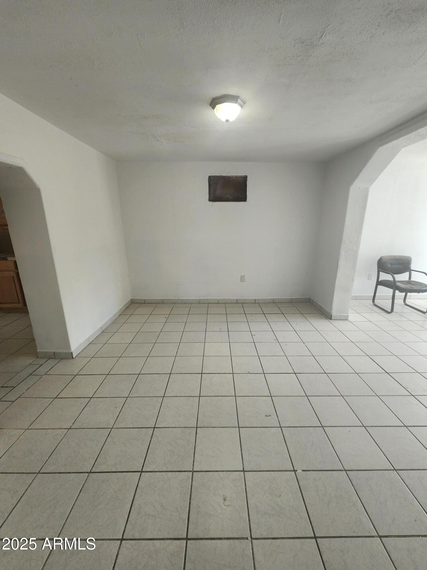 730 1st Street Douglas, AZ 85607 - Photo 9 of 13 a view of an empty room and window