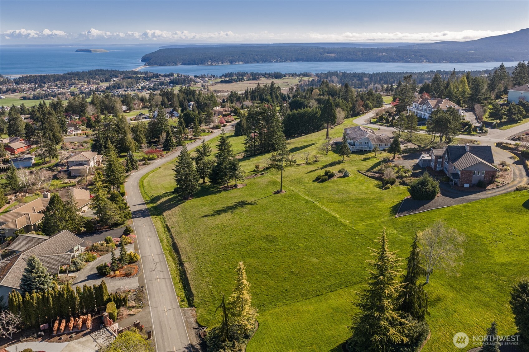 9999 Fawn Lane Sequim, WA 98382 - Photo 15 of 28 an aerial view of residential houses with outdoor space