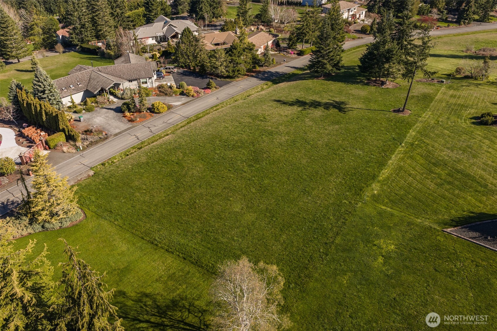 9999 Fawn Lane Sequim, WA 98382 - Photo 28 of 28 a view of a lake with houses