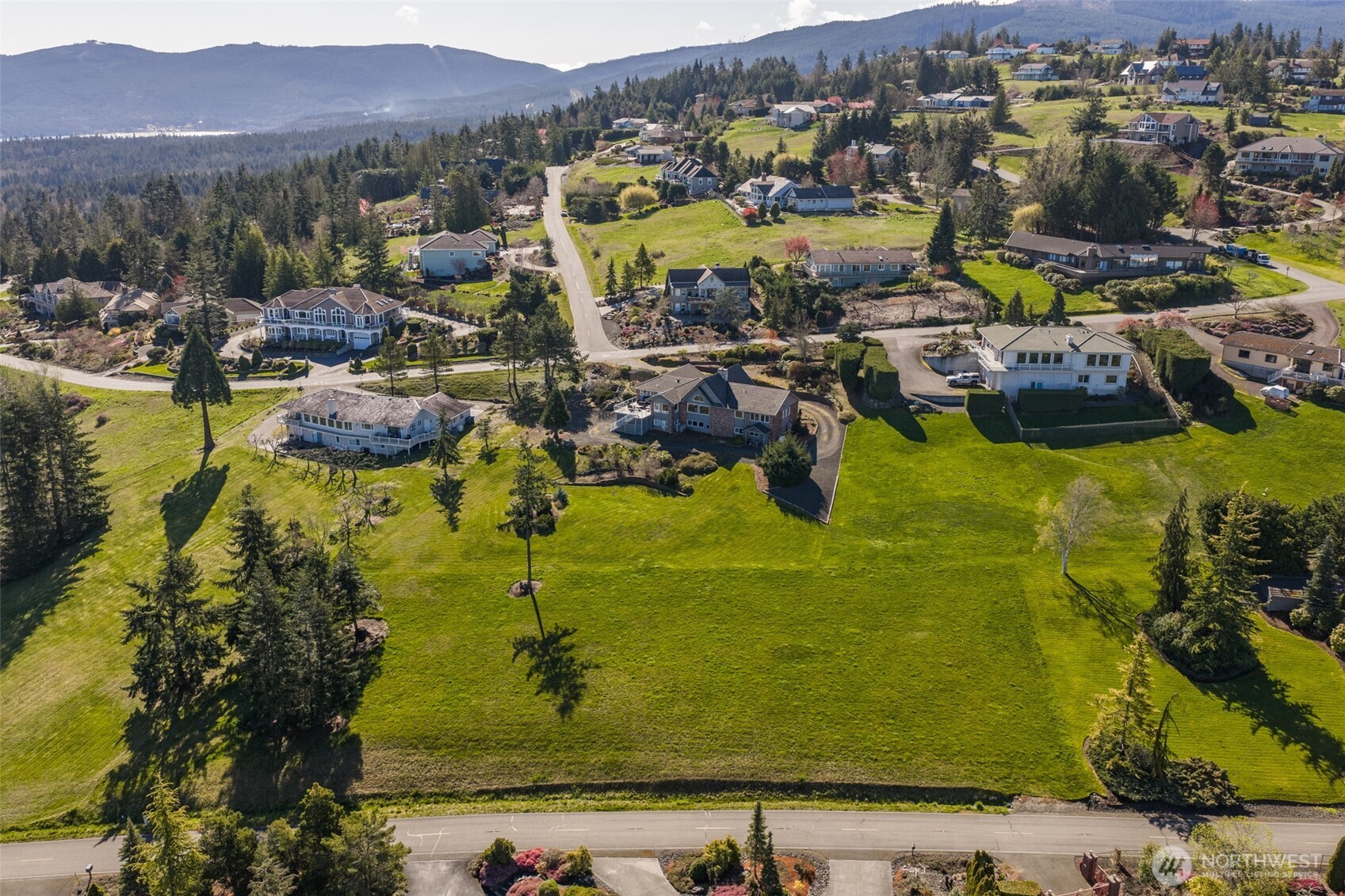 9999 Fawn Lane Sequim, WA 98382 - Photo 5 of 28 an aerial view of residential houses with outdoor space