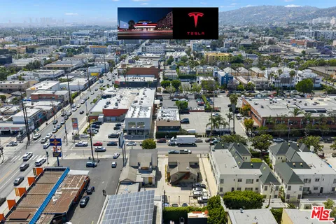 an aerial view of a city with lots of residential buildings