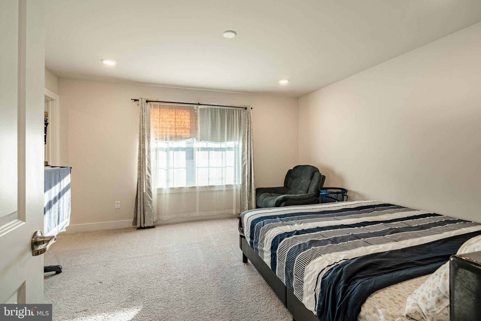 228 Red Leaf Lane Exton, PA 19341 - Photo 15 of 26 a bedroom with a bed and a window