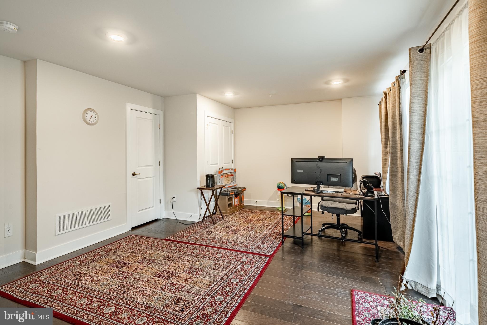 228 Red Leaf Lane Exton, PA 19341 - Photo 22 of 26 a living room with furniture and a rug