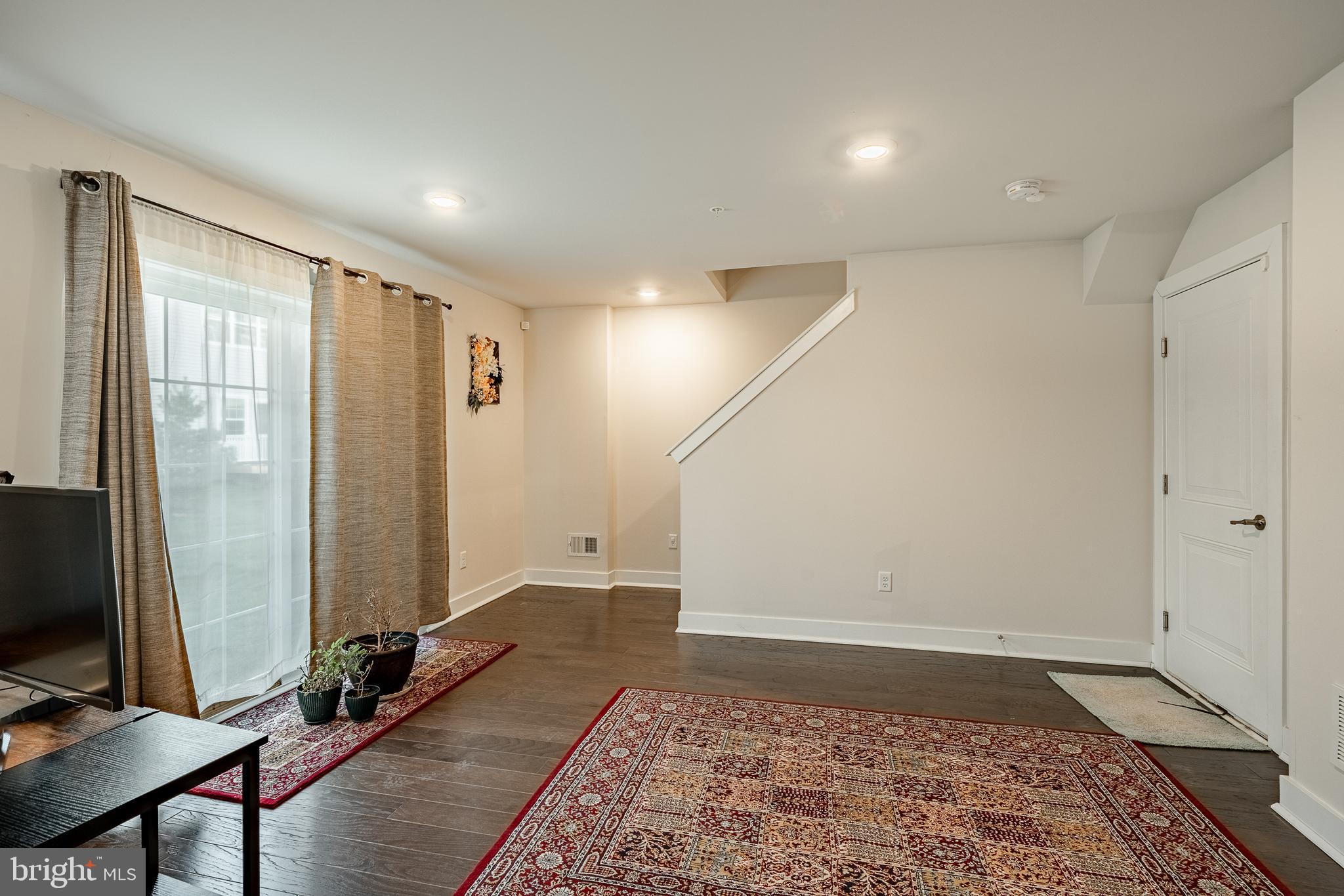 228 Red Leaf Lane Exton, PA 19341 - Photo 23 of 26 a view of a room with gym equipment and a rug