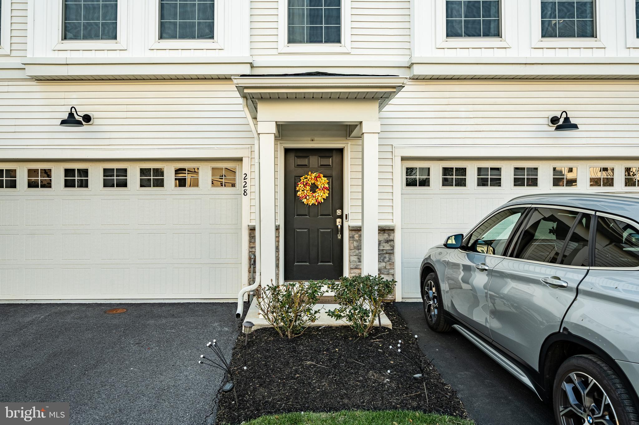 228 Red Leaf Lane Exton, PA 19341 - Photo 4 of 26 a front view of a house with garden
