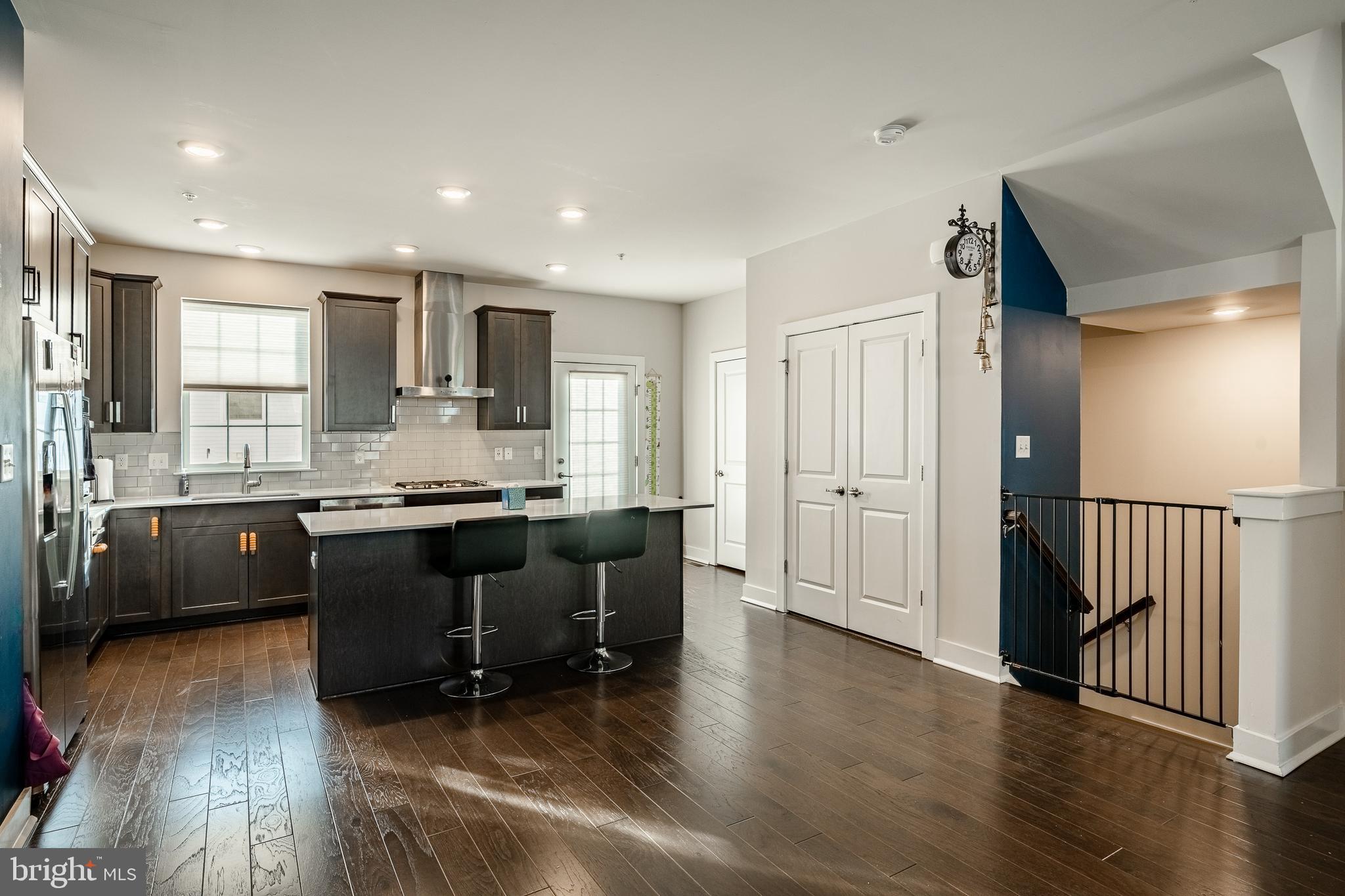 228 Red Leaf Lane Exton, PA 19341 - Photo 6 of 26 a large white kitchen with lots of counter space a sink and appliances